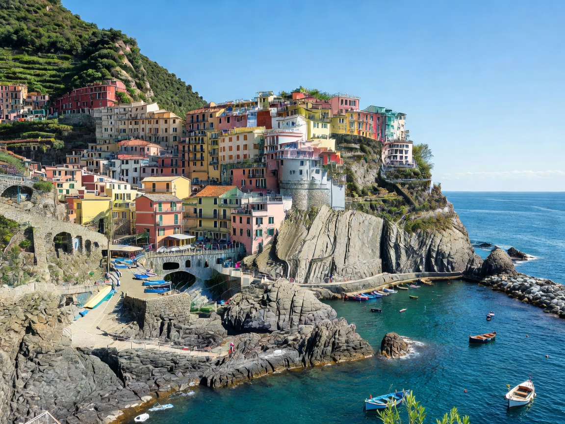Cinque Terre and Ligurian coast colorful cliffside village above emerald waters